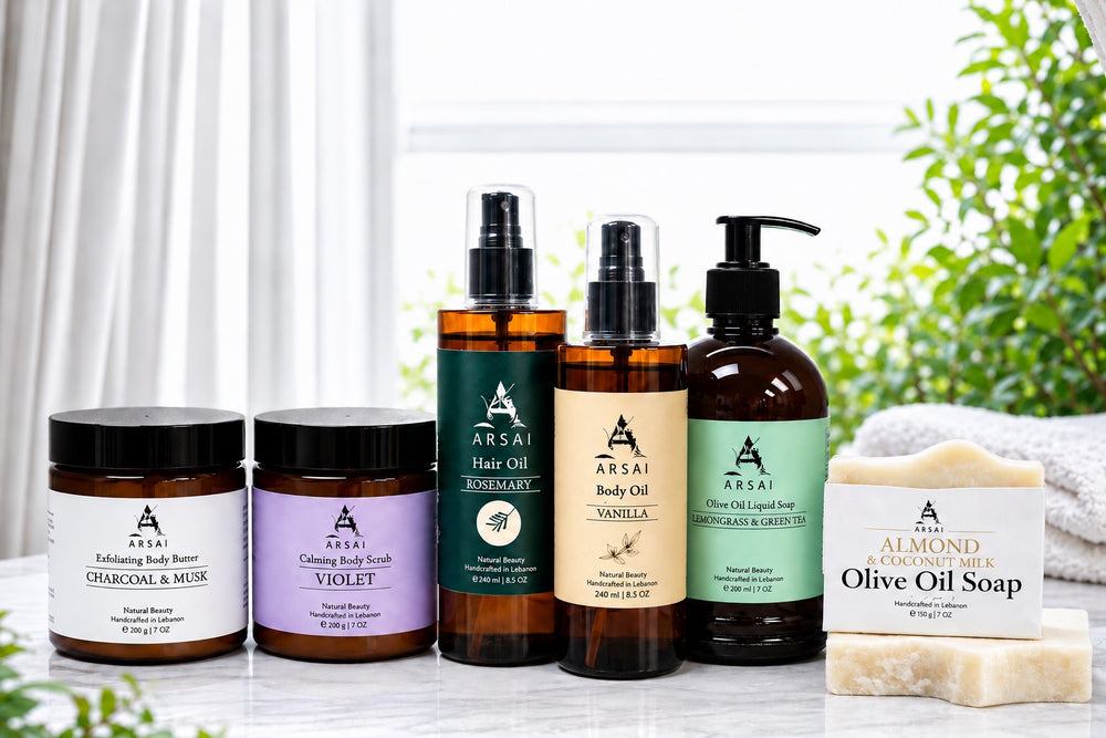 Arsai natural skincare collection featuring body butter, body scrub, rosemary hair oil, vanilla body oil, liquid olive oil soap and olive oil soap.